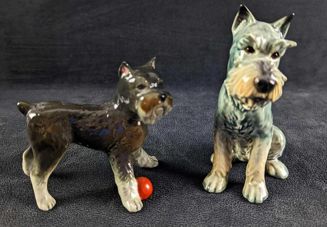 2 West Germany Goebel Schnauzer Dog Figurines: This lot includes: (1) West Germany Goebel Schnauzer Dog Figurine. Is approx 3" x 3" x 5" and it weighs 0.22lb. (1) West Germany Goebel Schnauzer Dog With Ball Figurine . Is approx 4" x 2" x 3 3/4" an