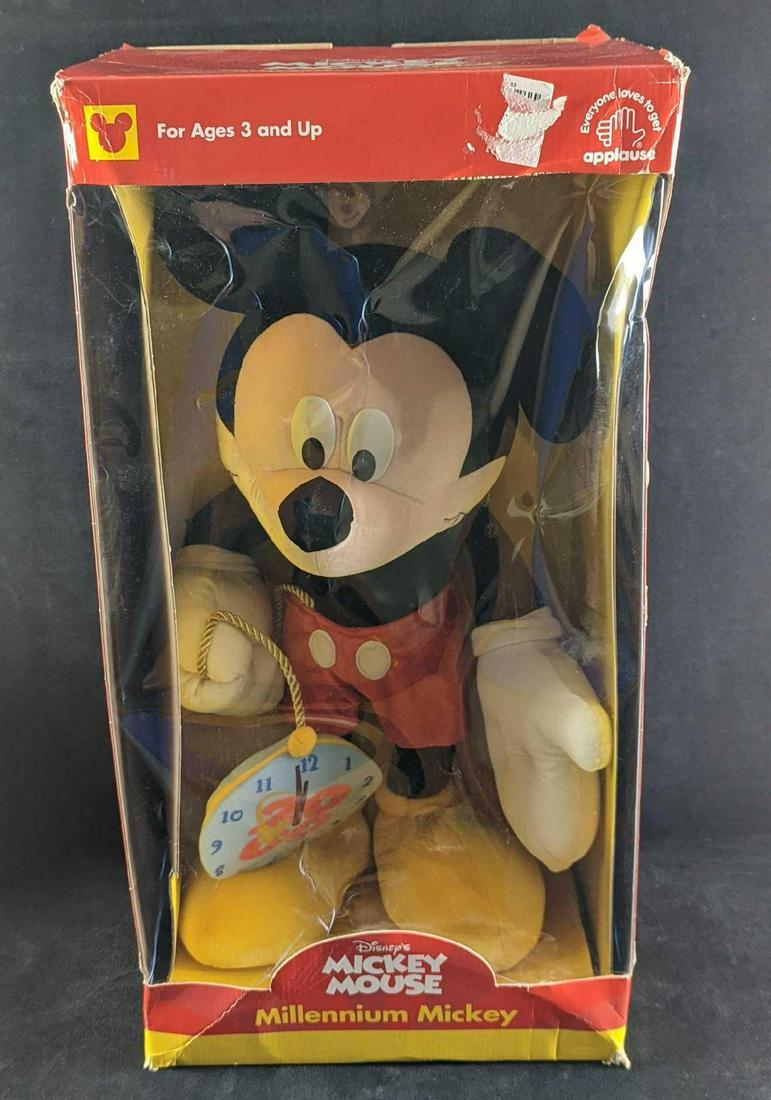 Applause LE Disney Millennium 20" Plush Mickey Mouse: Applause LE Disney Millennium 20" Plush Mickey Mouse. Comes in its original box which is approx 12" x 9 1/2" x 23 3/4" and it weighs 4.10lbs. This one is #2591 out of #10000. The box has some shelf-we