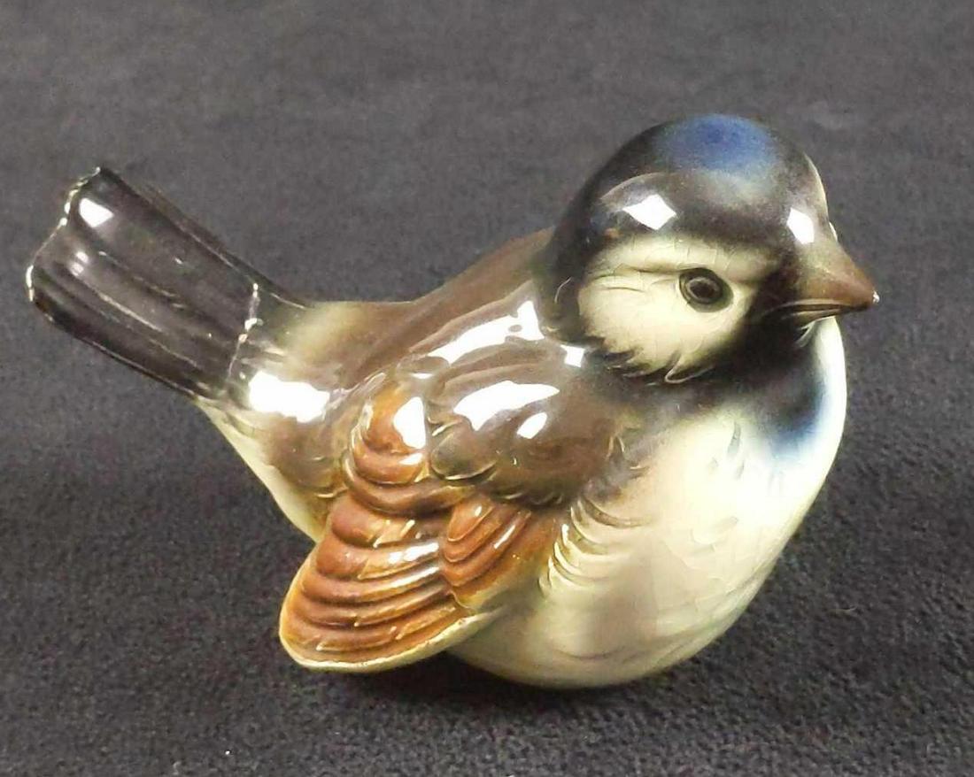 Goebel Blue Headed Sparrow Figurine CV73 TMK 6: Goebel blue-headed sparrow. CV73. TMK-6 (Made during the 1990s.). Bird is approx 3 1/2" x 2" x 3". Has a small crack on the bird's tail feathers. Please see images for details.