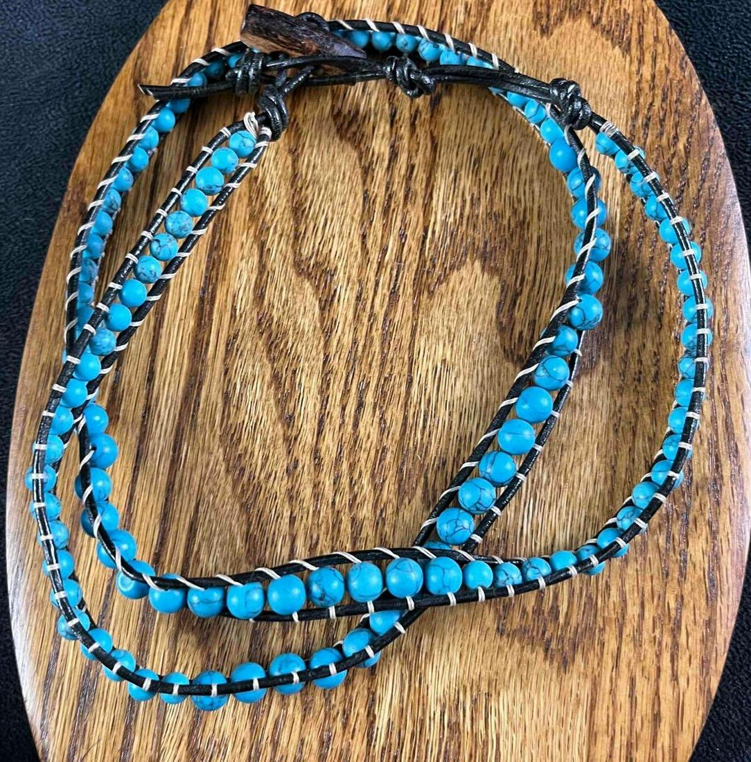Turquoise and Leather Belt Turquoise Necklace: Turquoise and Leather Belt Turquoise Necklace This is a beautiful handmade turquoise beaded belt or necklace. The item is 36" long so it could be used as a belt or a long necklace, whichever is prefer