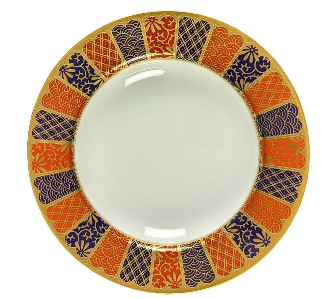 Retired Fitz and Floyd Shinmonzen Large Rim Bowl: This series was released only during the year 1991. The large rim bowl is approx 9 1/4" x 9 1/4" x 1 1/2" and it weighs 1.01lb. The bowl is in a good, used condition with no chips or cracks. Please se