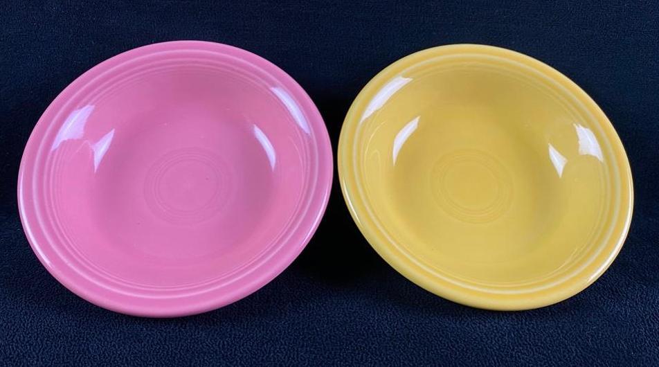 2 HLC Fiestaware Sauce/Dessert Bowls: 2 HLC Fiestaware Sauce/Dessert Bowls Pair of small sauce/dessert bowls from the Fiestaware line by Homer Laughlin China Co. The bowls are yellow and pink, and are in good condition with no known chips