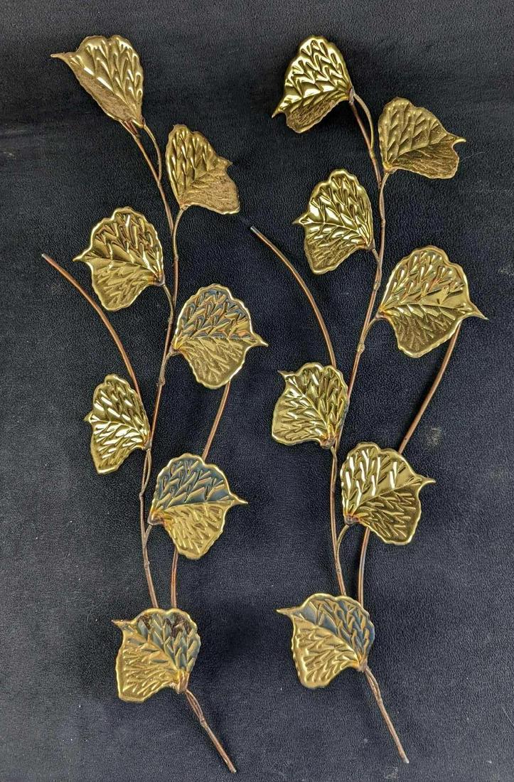 Two Vintage Wall Mounted Gold Tone Metal Leaves: Two Vintage Wall Mounted Gold And Copper Tone Metal Leaves. The make and date of the creation are unknown. Adds a bit of color and style to any wall. The wall leaves are in a good, vintage condition w
