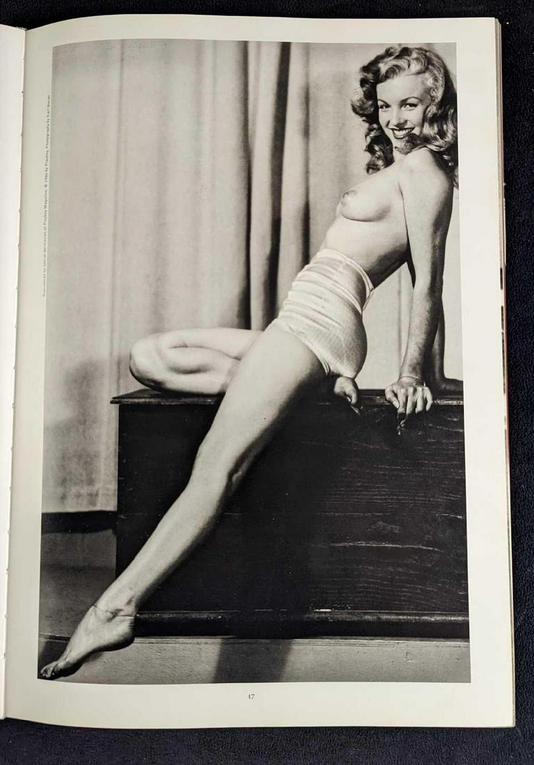 Marilyn Monroe And The Camera Hardcover Book: "Marilyn Monroe And The Camera". With a forward by Jane Russell and an interview by George Belmont. This was published by Bulfinch Press Book (Boston) and copyrighted in 1989. First United States Edit