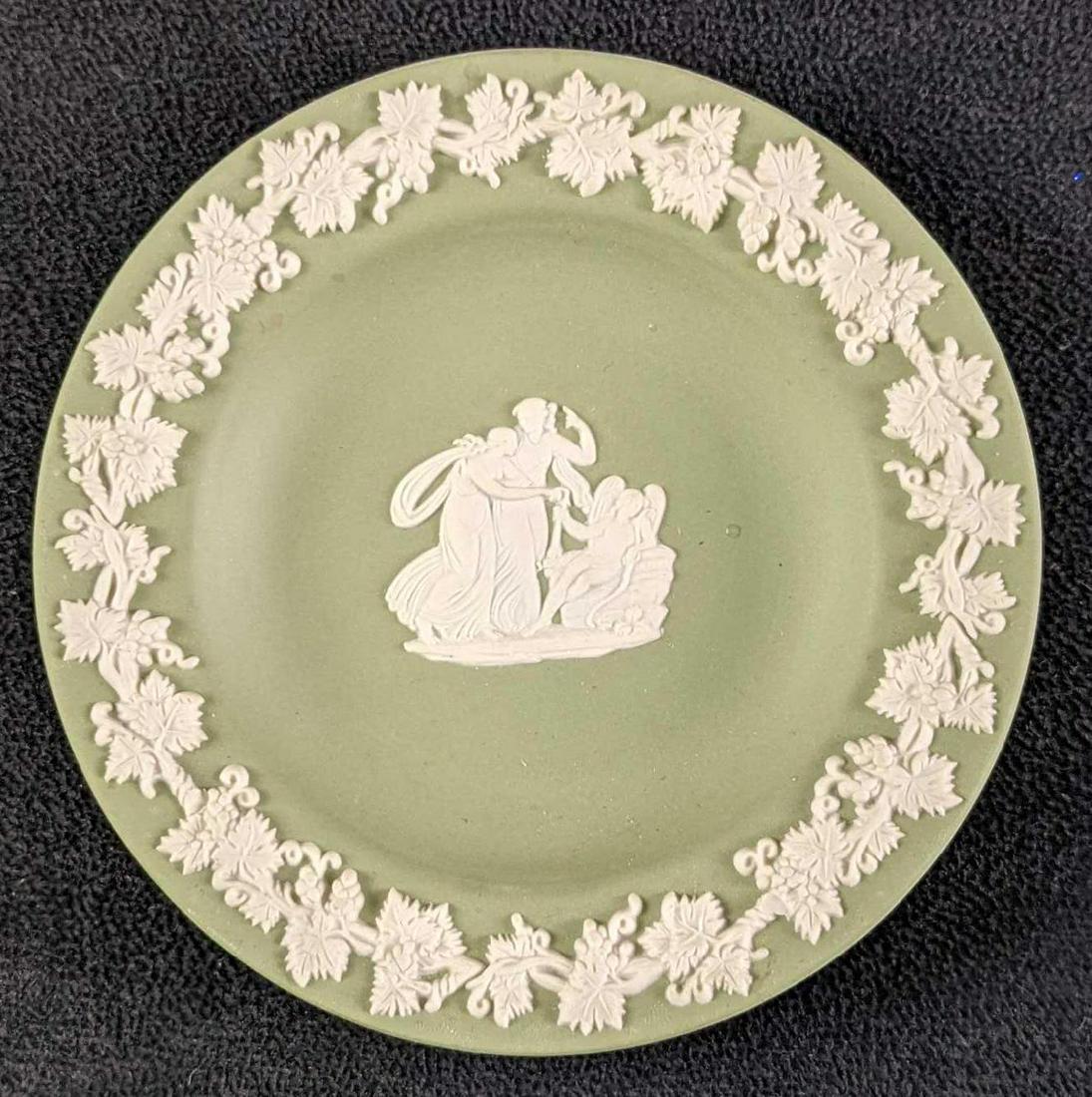 Wedgewood Cream Color on Celadon Jasperware Plate: Retired Wedgewood Cream Color on Celadon Jasperware Plate. The plate is approx 4 1/2" x 4 1/2" x 3/4" and it weighs under one pound at 0.24lb. The plate is in a good, vintage condition with light wear