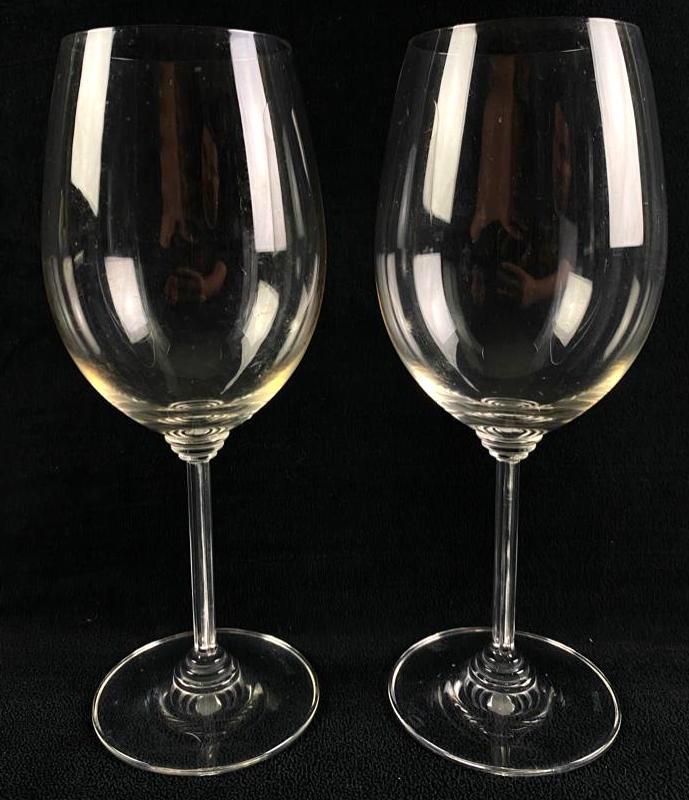 Pair of Riedel Red Wine Glasses: Pair of Riedel Red Wine Glasses For 300 years Riedel has been a leader in European crystal stemware, and this pair of merlot/cabernet glasses is no exception. The stem shape evokes the columns of anci
