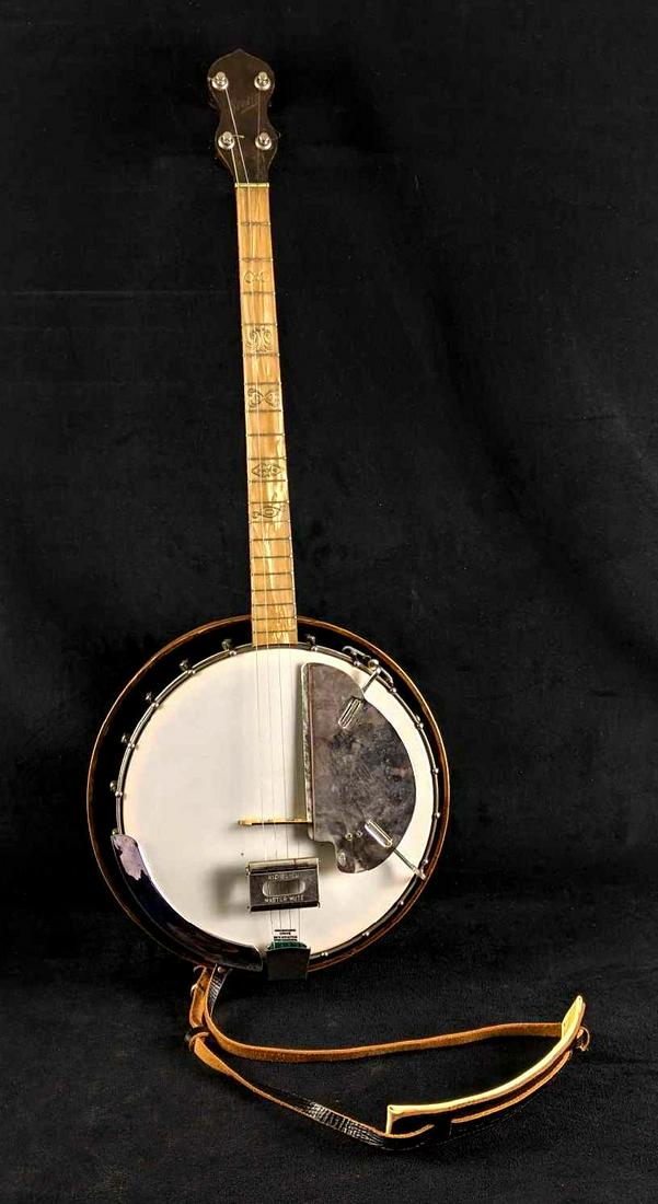 Vintage 4-string Stella Banjo With Pickguard: Vintage 4-string Stella Banjo With Pickguard This banjo is beautiful. This Stella Banjo has a painted resonator and seems to be in great condition. The fretboard is natural inlaid. It has some added m