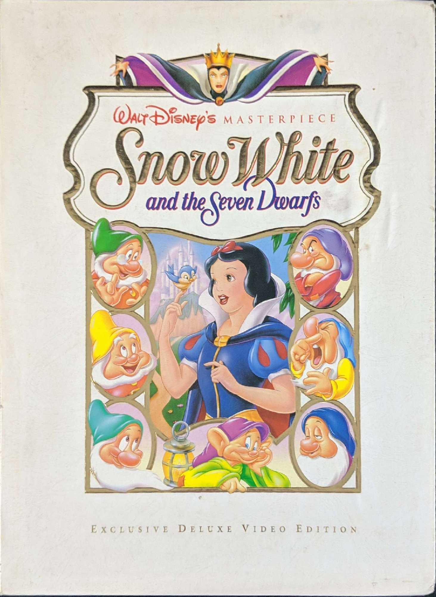 Snow White & The Seven Dwarfs Deluxe VHS Edition: This set comes with: (1) The Making Of The Classic Film Hardcover Book. Has over 80 pages of art, and information about Disney's classic animated movie. (1) The Making Of A Masterpiece VHS unopened. A
