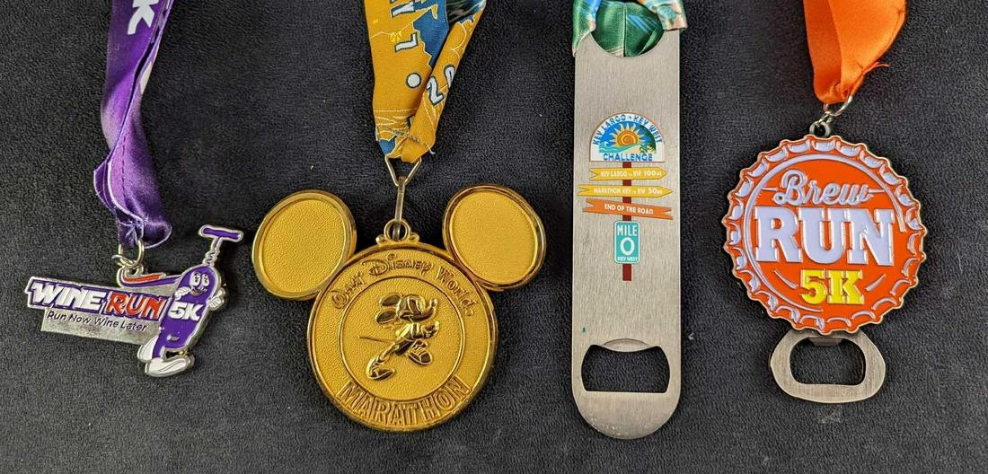 JB 3 Racing Medals Disney Wine Beer & Key Largo: This lot includes: (1) Brew Run 5K Bottle Cap Medal. Also works as a bottle opener. Is approx 3" x 20". (1) Key Largo/Key West Challenge Medal. Also works as a bottle opener. Is approx 2" x 21". (1) W