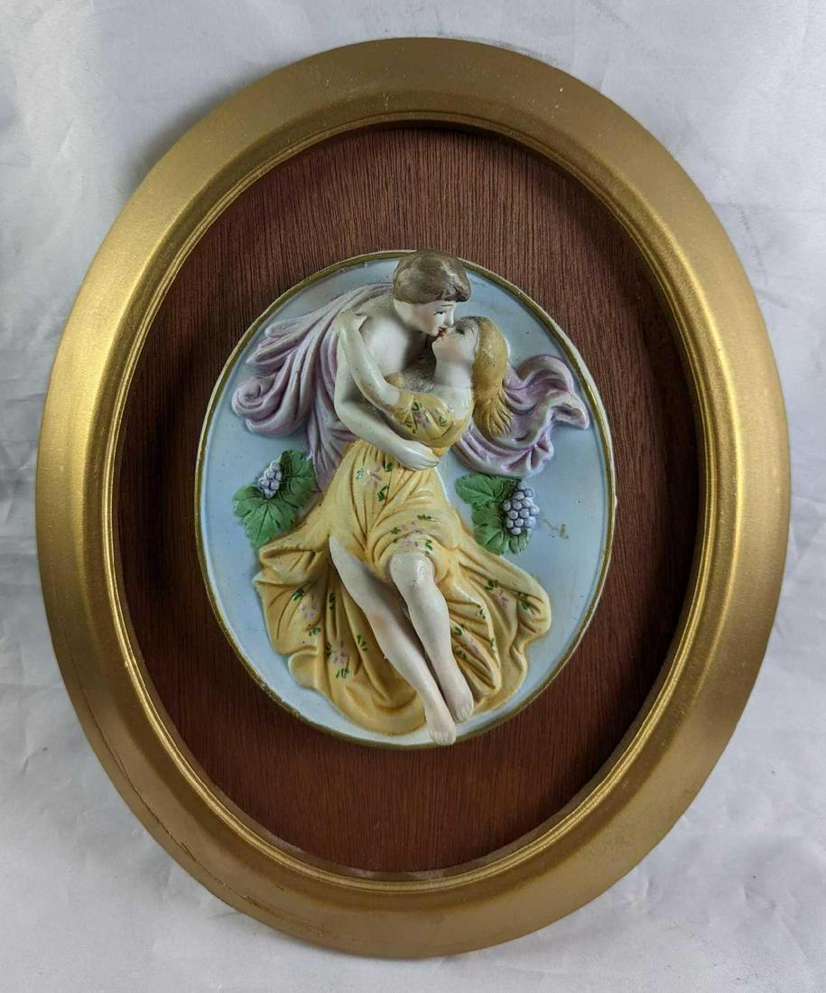 Vintage Capodimonte Man & Woman Wall Plaque: Vintage Capodimonte Man & Woman Plaque. Is approx 9 3/4" x 3" x 12" and it weighs 1.67lb. The wall plaque is in a good, vintage condition with some markings and scratches and a rather deep scratch on 