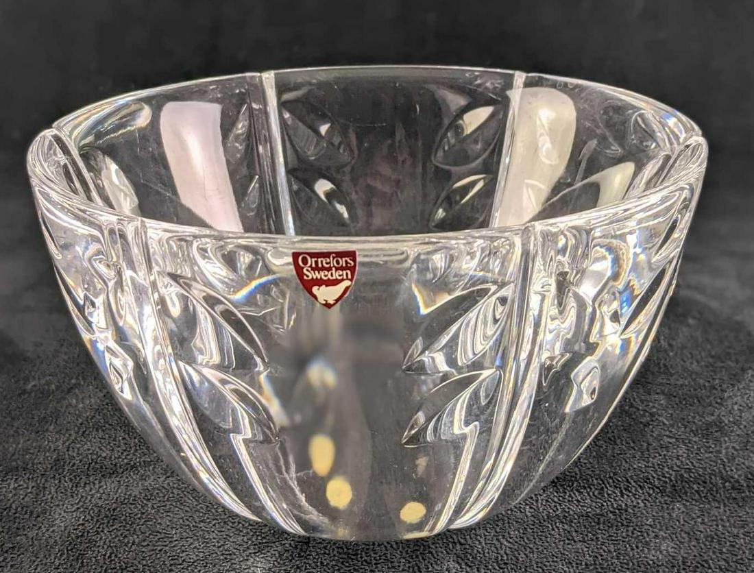 Retired Orrefors Sweden Crystal Falling Leaves Round Bowl: Retired Orrefors Sweden Crystal Falling Leaves Round Bowl. Was released from 1989 to 2000. The bowl is approx 6" x 6" x 4" and it weighs 3.25lbs. The bowl is in a good, used condition with a couple of