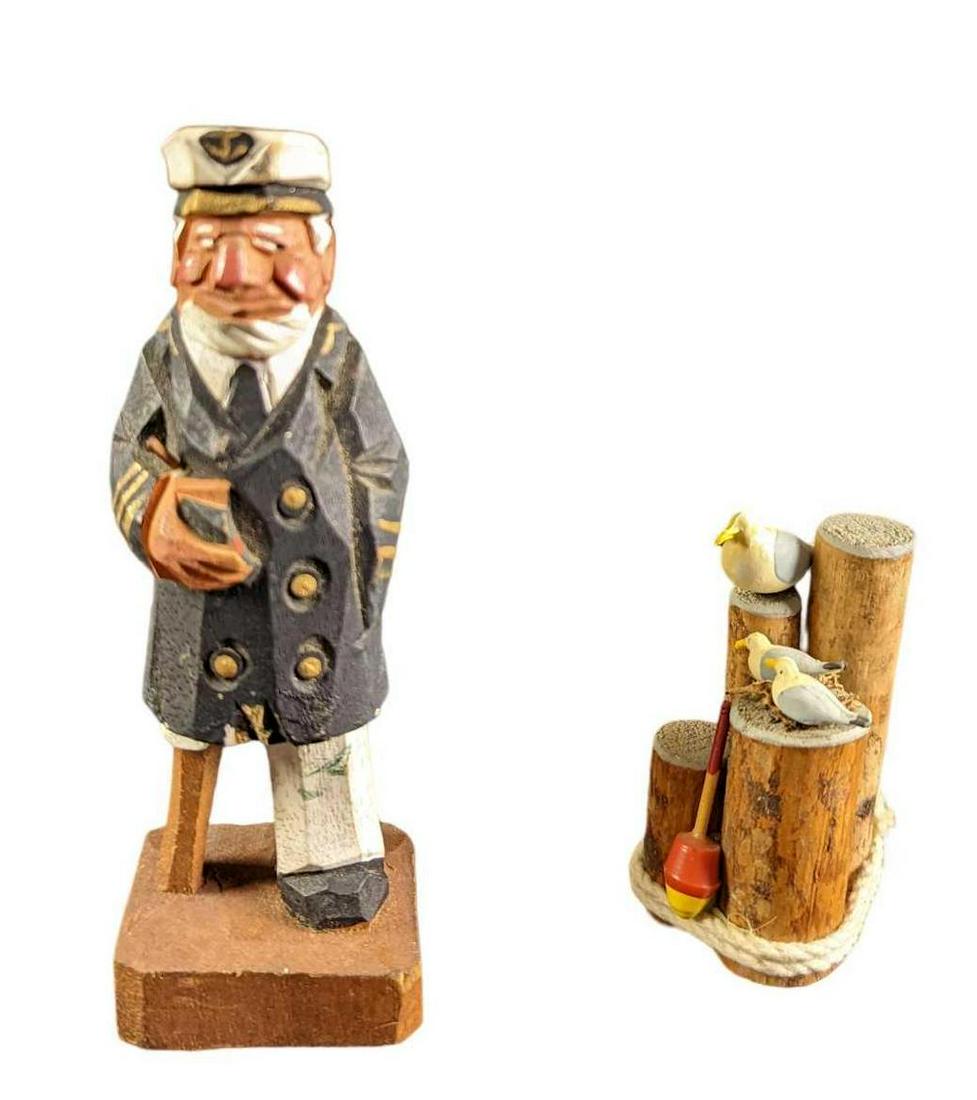 Wooden Sea Captain With Seagull Figurines: These two little wooden figures will add a touch of the sea to any desk, shelves, counter, or any flat surface on they are placed. This lot includes: (1) Wooden Peg Legged Captain figurine. Is approx 