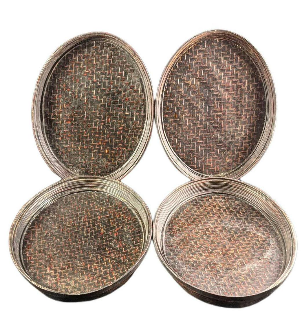 4 Vintage Black Woven Wicker Style Serving Trays: 4 Vintage Black Woven Wicker Style Serving Trays. The maker and date of creation are unknown. Each tray is approx 18" x 14" x 2" and they weigh (all four) 4lbs. The trays are in a good, vintage condit