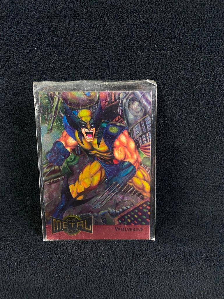 1995 Marvel Metal Blasters Wolverine: 1995 Marvel Metal Blasters Wolverine Fleer-made Marvel trading card, printed in 1995 featuring Wolverine. This example is in exceptional condition with few, if any minor defects. Approximate size: 3.5
