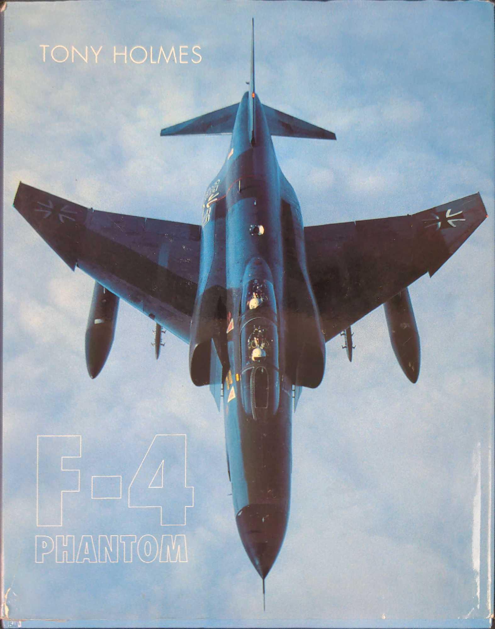 F-4 Phantom Hardcover By Tony Holmes Military Planes: F-4 Phantom By Tony Holmes. Was published by Chancellor Press (UK) in 1990. The book is approx 9 1/2" x 1/2" x 11 3/4" and is in a good, used condition with shelf-wear on the dust-jacket. This is a de