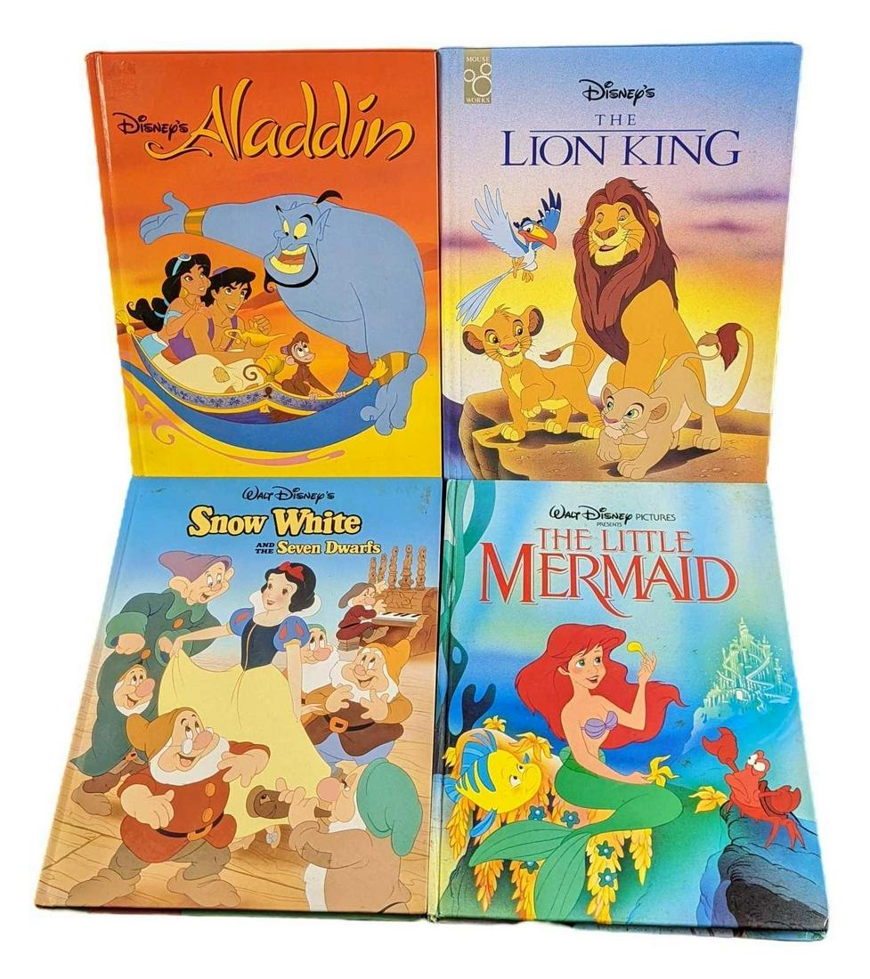 Four Hardcover Class Animated Disney Storybooks: This lot includes: (1) The Lion King. Adapted by Don Ferguson. Published by Mouse Works in 1994 (New York). (Bottom corners on right side of the pages have creases) (1) Aladdin. Adapted by Don Ferguso