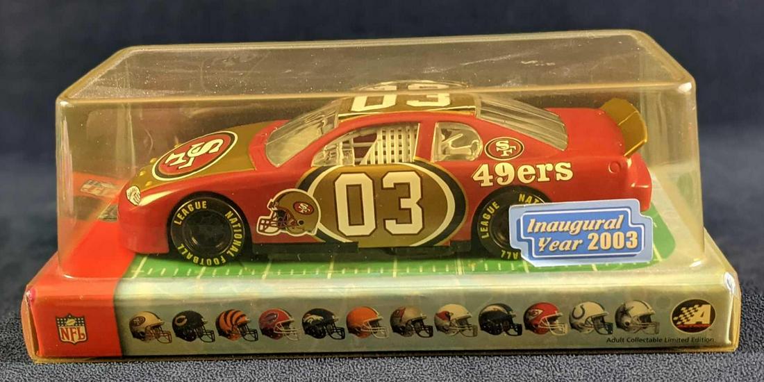 Winners Circle San Fran Giants NFL Football Race Car: 2003 Winners Circle San Francisco Giants NFL Football Die Cast Race Car. Still sealed in its original box which is approx 10" x 5" x 4" and it weighs 1.21lb. The car is in a good, unused condition wit
