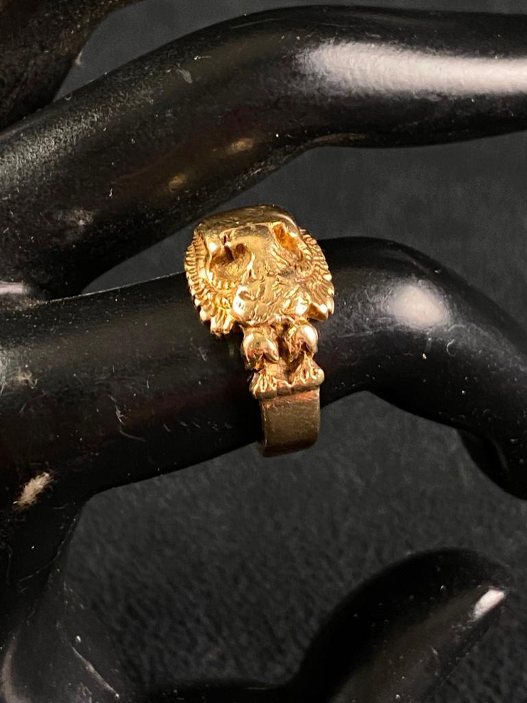 10K Gold Eagle Ring: 10K Gold Eagle Ring DETAILS: Metal - 10K Gold Color - Gold Tested - Yes Size - 0.9" x 0.86" x 0.46" Weight - 5.6g Markings - 14k Maker - unknown Stones - none Style - ring with eagle design Condition