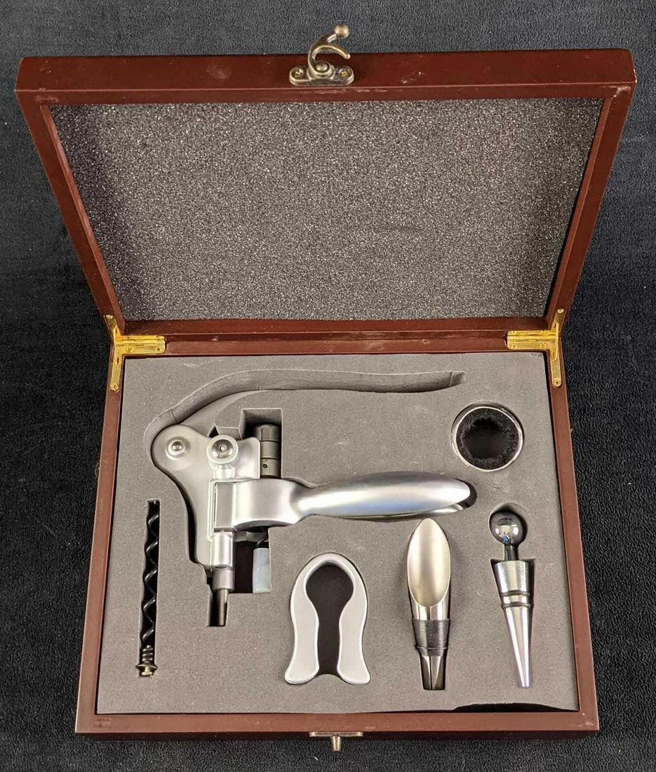 Rosewood Finish 5 Piece Wine Tool Set: A unique and fun gift for the lover of fine wines in your circle of family and friends, this five-piece personalized wine accessory set has everything they'll need to enjoy a delicious glass. This gif