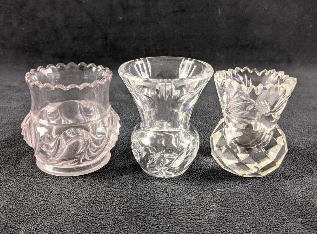 Three Glass Bud Vases: These glass bud vases could also be used as toothpick holders or for other needs. These are in good vintage condition with no known damage. These are all about 2in - 2 1/2in tall. Weight: 1lbs