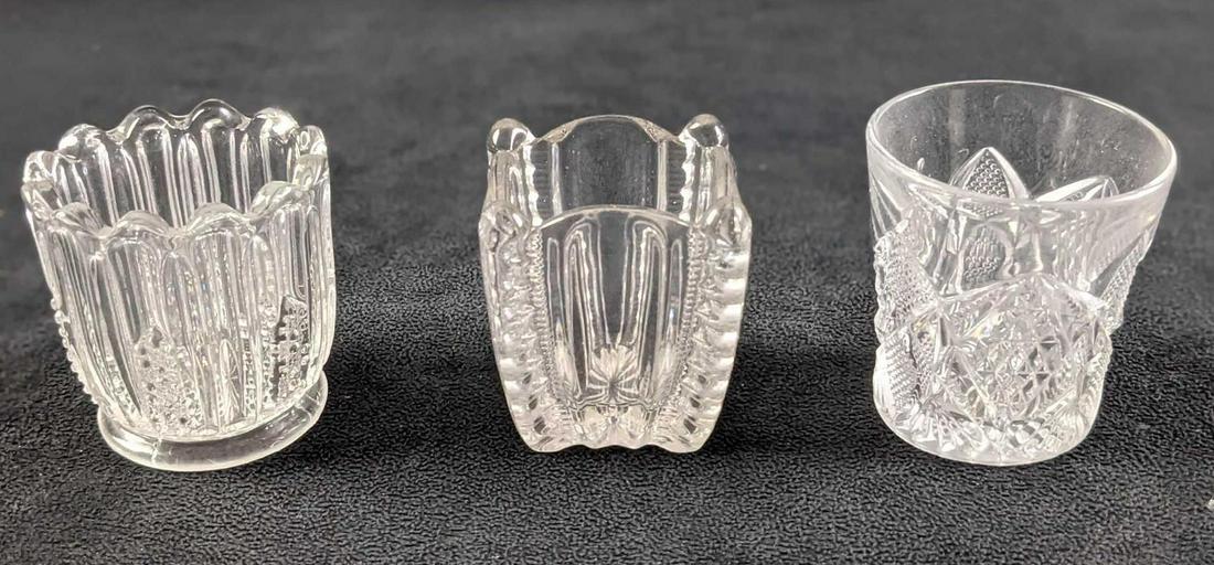Three Clear Glass Pod Vases Or Toothpick Holders: Three Clear Glass Pod Vases Or Toothpick Holders. Both range about 2" x 2" x 2 1/2" and the makers and date of creation is unknown. Together they weigh under one pound at 0.65lb and all are in a good,