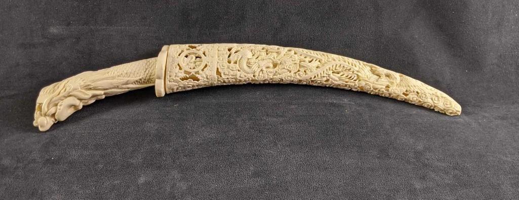Bone Ivory Knife Faux Ivory Dagger: Bone Ivory Knife Faux Ivory Dagger This dagger is only for decoration, this is not sharp. This dagger is made of plastic or resin to mimic ivory. This is beautifully designed 21in long Weight: 1lb
