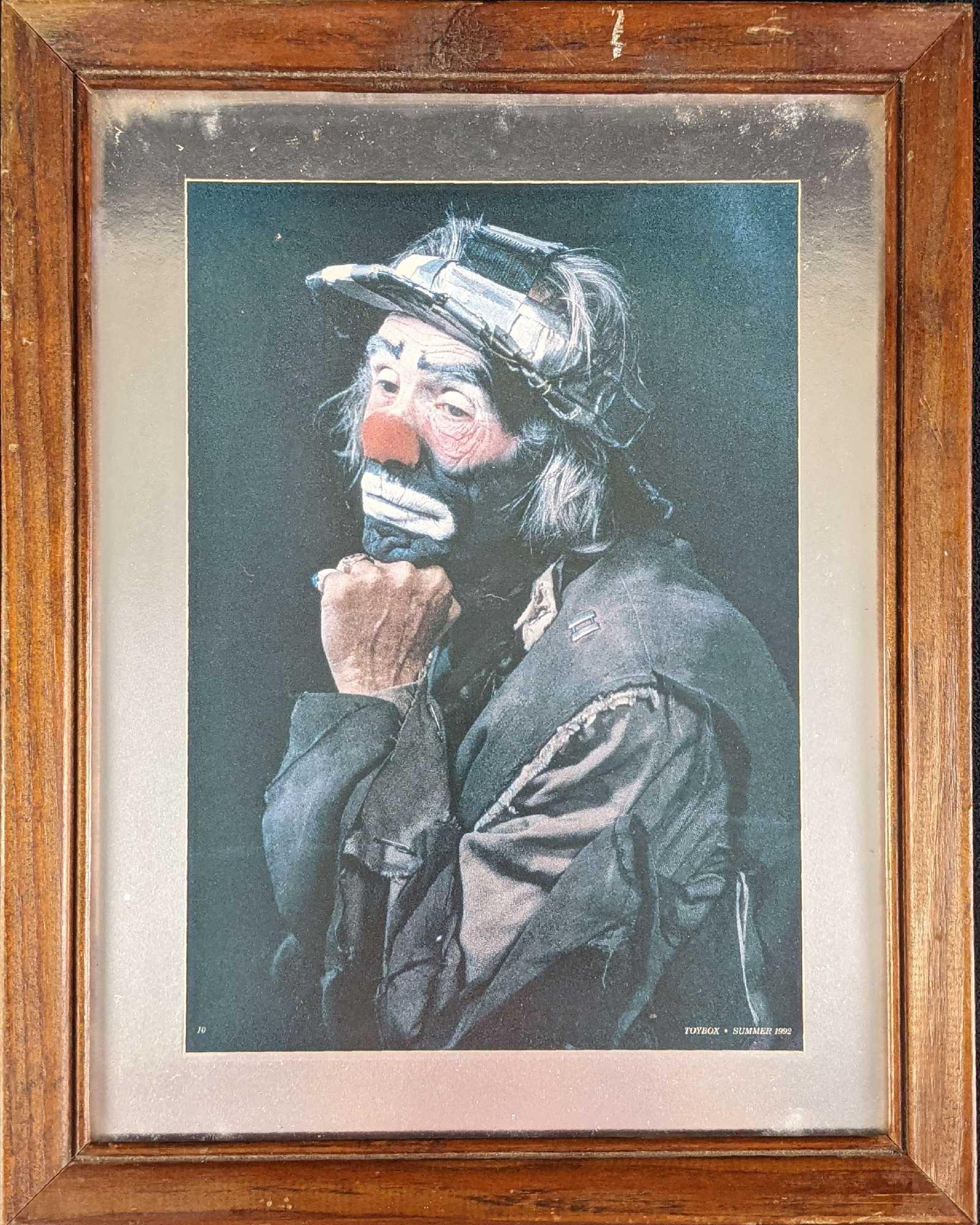 Framed Photo Print Of Emmett Kelly Jr: Framed Photo Print Of Emmett Kelly Jr. Shows the famous hobo clown as he was caught in a moment of thought. The framed photo print is approx 11 1/4" x 1" x 14 and weighs 1.5lbs. The framed photo print