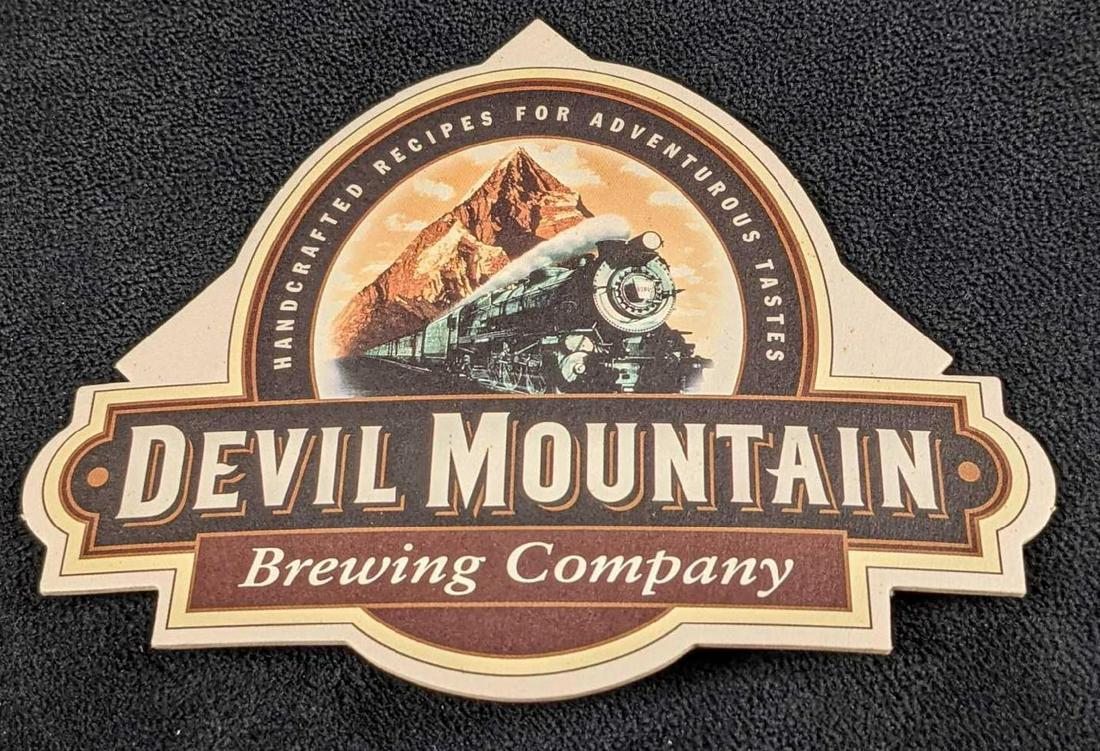 25 Rare Devil Mountain Brewing Company Coasters: 25 Rare Devil Mountain Brewing Company Coasters. Coasters are approx 6' x 4 1/2" x 1" and are all in good, unused condition with a couple on the bottom having a light curve in the middle.