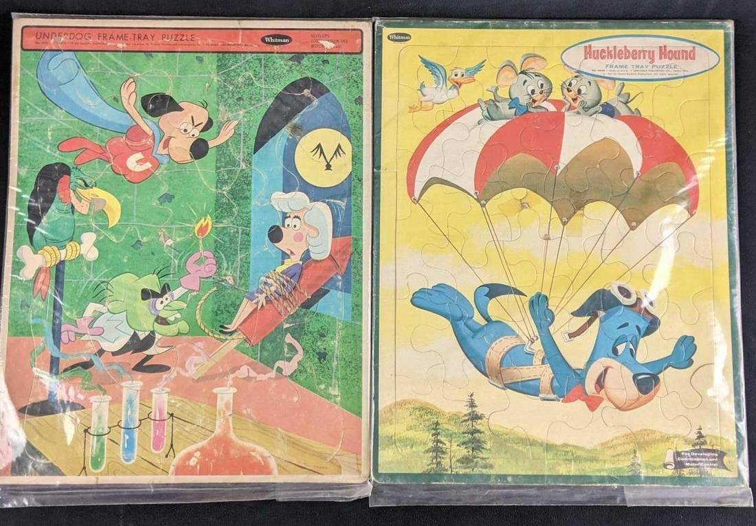 Vintage UnderDog Huckleberry Hound Frametray Puzzle: Vintage UnderDog Huckleberry Hound Frametray Puzzle Two complete puzzles in this lot. They are in protective plastic coverings. Age wear but in good condition. (1) Underdog Frame-Tray Puzzle (1) Huckl
