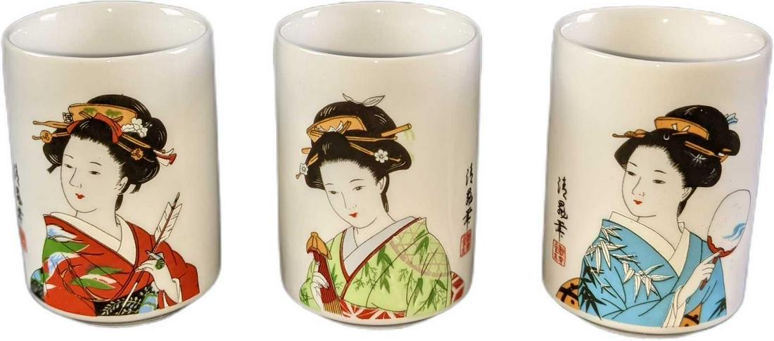Three Yamayo Vintage Geisha Girl Saki Wine Tea Cups: Three Yamayo Vintage Geisha Girl Saki Wine Tea Cups. Each cup is approx 2" x 2" x 3" and together they all weigh under one pound at 0.88lb. The cups are in a good, vintage condition with a small scrat