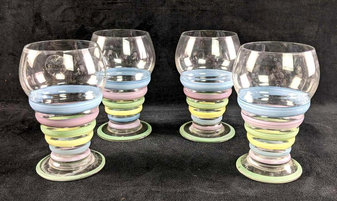 Glassware Candy Stripe by Gibson 16oz Glasses: Glassware Candy Stripe by Gibson 16oz Glasses This is a set of 4 Gibson candy stripe glasses. These are in good condition and have colorful stipes going around them. Weight together: 1lb 6in tall 3 1/