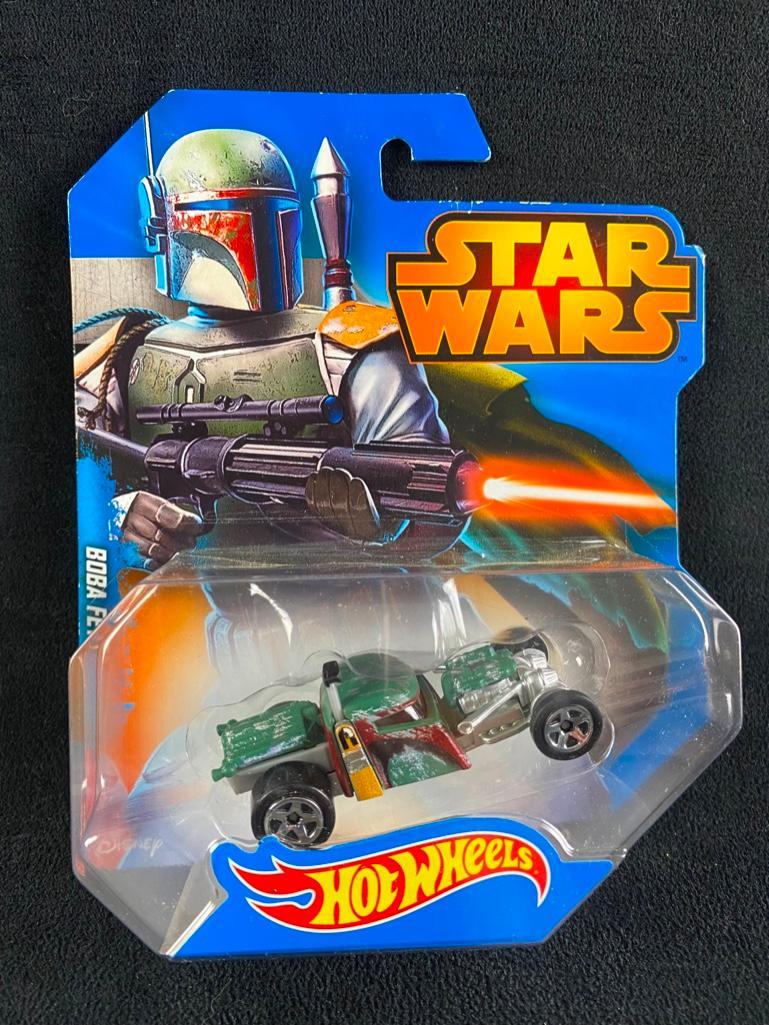 Boba Fett Hot Wheels Star Wars Car New in Box: Boba Fett Hot Wheels Star Wars Car New in Box Special edition Star Wars Hot Wheels hot rod, featuring Boba Fett. In good condition, in the original unopened packaging. From the 2014 series. Approximat