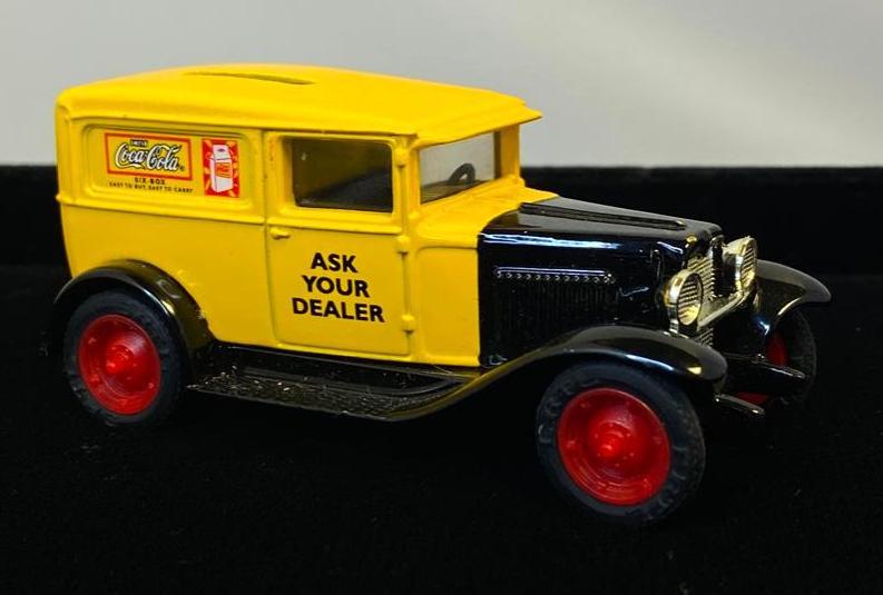 Coca-Cola Die-Cast Panel Van Bank: Coca-Cola Die-Cast Panel Van Bank Die-Cast Panel Van bank from Coca-Cola, in yellow and black color scheme. Made in 1999. In good condition with no known damage, aside from some very small nicks in th
