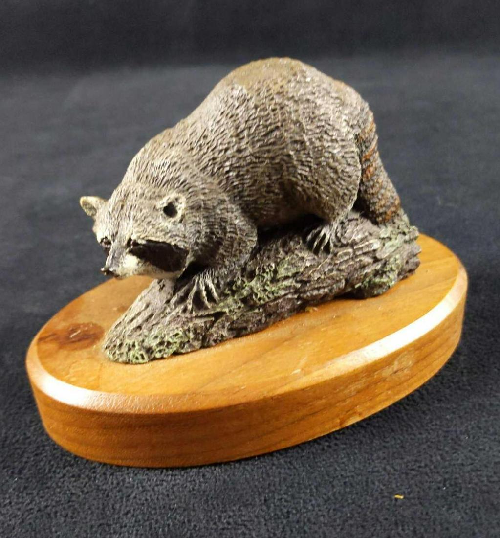 Vintage Hamilton Collection Audubon Bronze Raccoon: Vintage 1977 The Hamilton Collection, The Audubon Bronzes by Norman & Herman Deaton, a Collectors Cabinet Edition. The Raccoon Figurine is on an oval wooden base with the original sticker on the botto