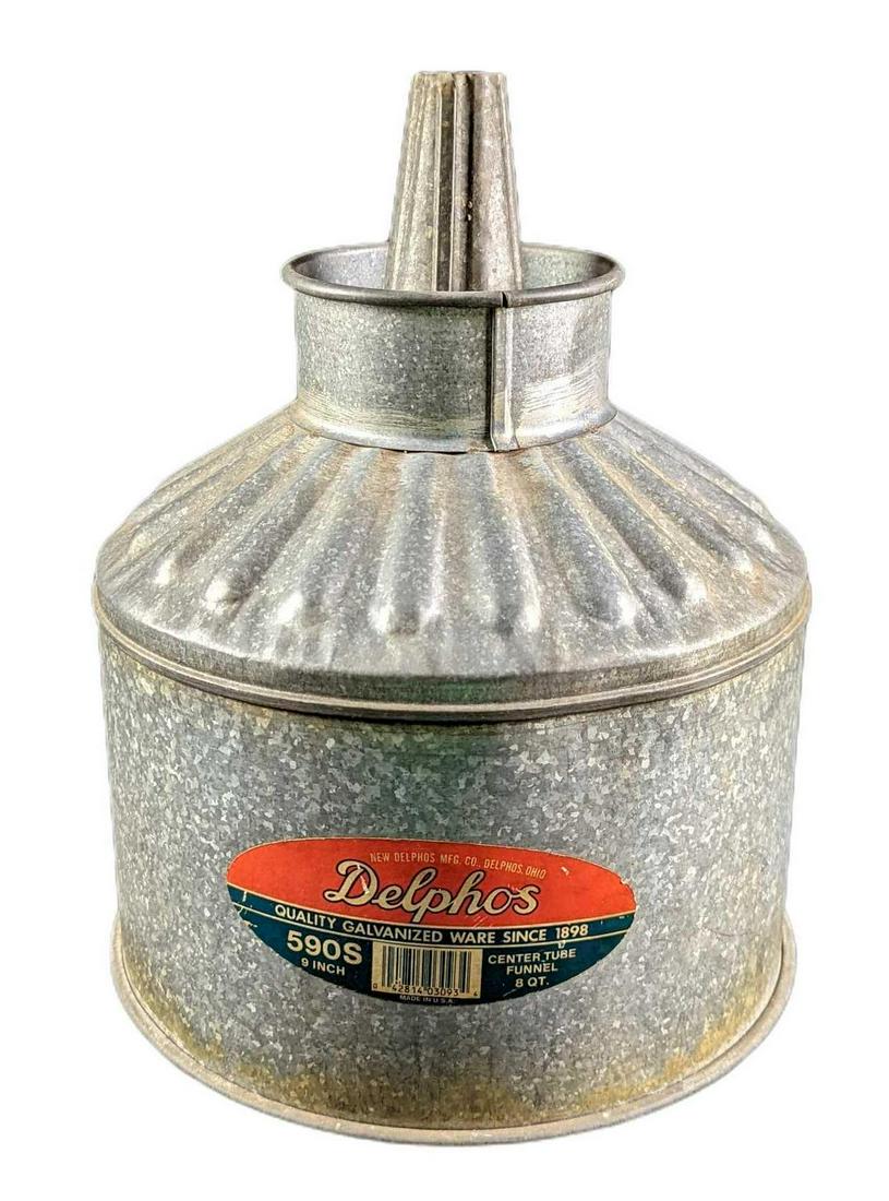 Vintage Delphos Galvanized Center Tube Funnel: Delphos Galvanized Center Tube Funnel. Is approx 9 1/2" x 9 1/2" x 12" and it weighs 1.5lb. The funnel is in a good, vintage condition with discoloration due to age. Please see the images as they are 