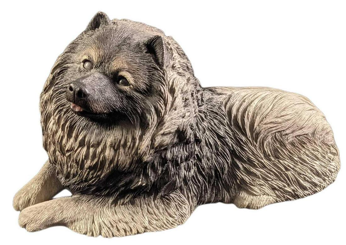 Keeshond Dog Figurine by Sandicast: Keeshond Figurine by Sandicast. The artist and founder are Sandra Brue. Sandra spends a tremendous amount of time researching each animal before she actually creates the sculptures. The sculpture is c