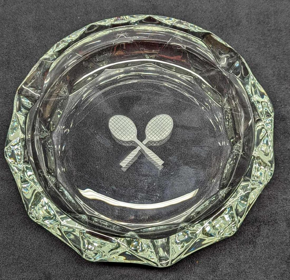 Vintage Crossed Tennis Rackets Crystal Ashtray: Vintage Crossed Tennis Rackets Crystal Ashtray. Maker and date of creation is unknown. The ashtray is approx 8 1/4" x 8 1/4" x 2 3/8" and it weighs 3.16lbs. The ashtray has no cracks or chips, and has