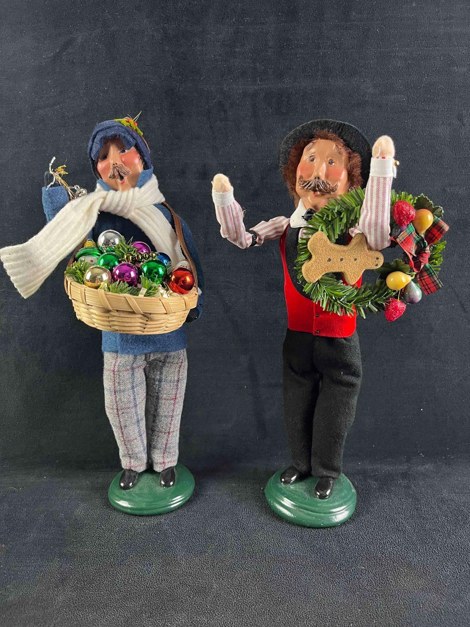Christmas Decorations The Carolers Byers Choice: Christmas Decorations The Carolers Byers Choice There are two men carolers including one who is an ornament salesman. These two decorations are in good condition with some pieces that may be missing. 