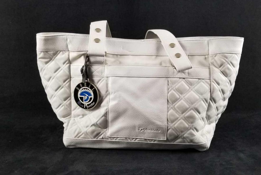 Doral Blue Monster White Nylon Shoulder Golf Bag Taylor Made: White shoulder golf bag Taylor Made embossed and has a DORAL Blue Monster metal tag, made in China look to have been marketed for TJ Maxx. Bag is white nylon with quilted pattern. Unknown if it is rea