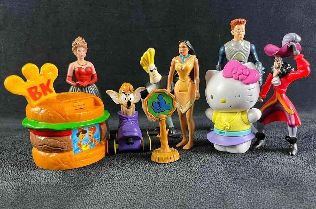 Assorted 90s and 2000s Small Action Figure Toys: Assorted 90s and 2000s Small Action Figure Toys This is a lot of 8 toys and one set up prob (stop and go sign). these are assorted characters from Joey Bravo to Hello Kitty. These are all in used but