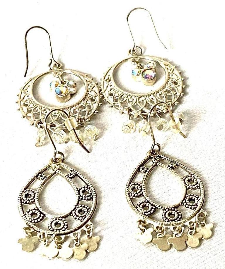 Authentic Disney Silver Plated Chandelier Earrings: Authentic Disney Silver Plated Chandelier Earrings. All pieces are tested and researched prior to listing. Please view all our pictures they are part of our description. DETAILS: Material: Silver Plat