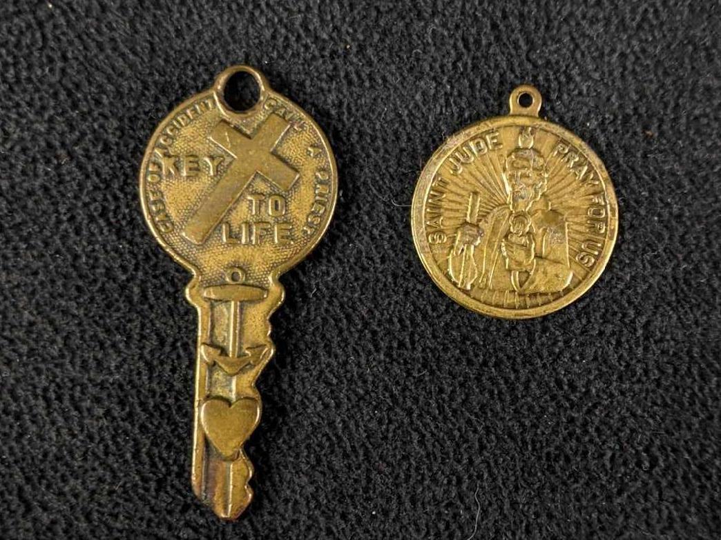 Prayer Charms Brass Key Charm and Circular Charm: Prayer Charms Brass Key Charm and Circular Charm These charms are brass with prayers on them They are in good condition just need to be polished up. These are small charms. One charm is key-shaped tha