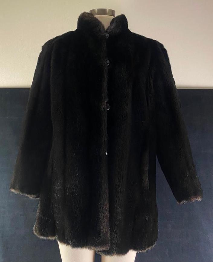 Mincara by Russel Taylor Faux Fur Jacket JB: Mincara by Russel Taylor Faux Fur Jacket JB Vintage Mincara coat, made by Russel Taylor. Appears to be from the 1970s or 1980s. In good condition, with no known damage. Has a floral patterned lining.