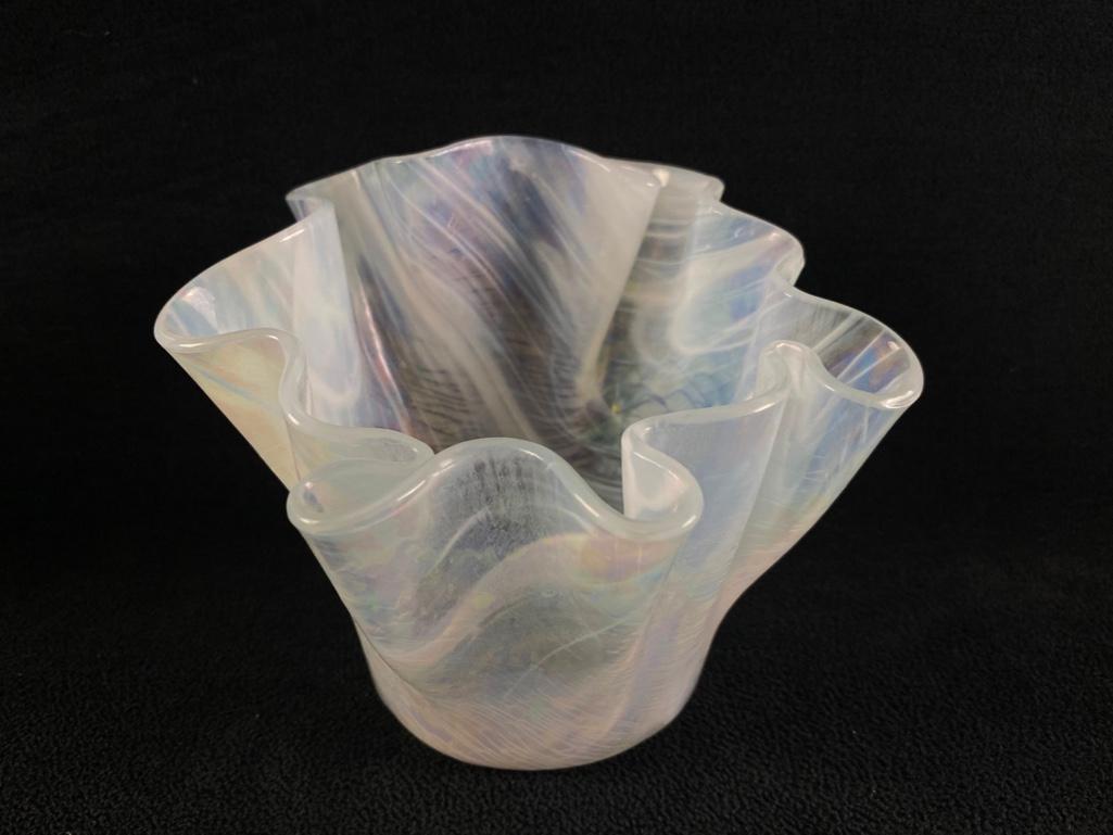 Art Glass - Vintage Pearlescent Vase: Art Glass - Vintage Pearlescent Vase Vintage vase with pearlescent and translucent glass, with milky swirls and lines. The piece has a wavy rim, and a wide base. In good condition with no known damage