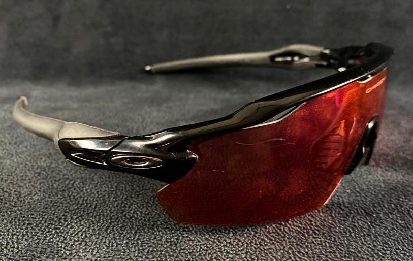 Oakley Radar EV Sunglasses: Oakley Radar EV Sunglasses Used Oakley Radar EV wraparound sunglasses in good condition with just some minor wear from use. The sunglasses have Prism lenses and rubber padded arms for added comfort an