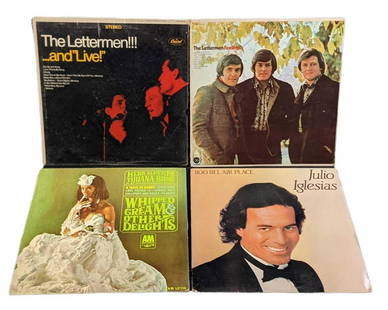 4 Vinyl LP Records Pop Iglesias: This lot includes: (1) Julio Iglesias - 1100 Bel Air Place. Was released by Columbia in 1984. (1) Herb Alpert & the Tijuana Brass - Whipped Cream & Other Delights. Was released by A&M Records in