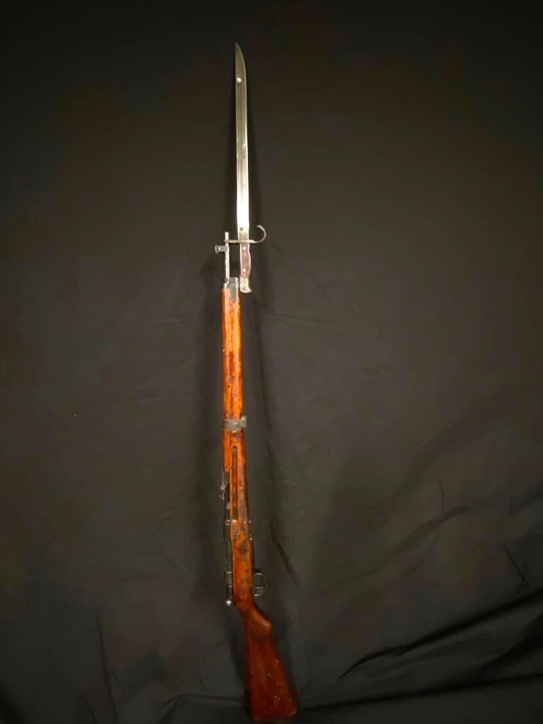 WWII Japanese Kokura Arisaka Type 99 With Bayonet: WWII Japanese Kokura Arisaka Type 99 With Bayonet Arisaka Type 99 carbine rifle made at the Kokura Armory, likely in 1941. Includes the original bayonet and scabbard, with matching armory mark. The re