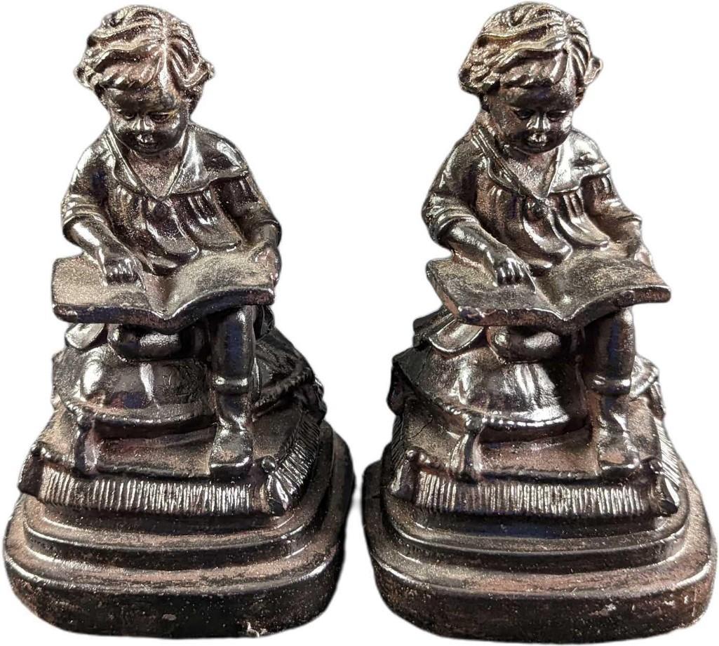 Victorian Trading Company Young Readers Bookend Set: Victorian Trading Company Young Readers Bookend Set. Made of a hard resin. Each bookend is approx 4" x 3" x 6 1/2" and together they weigh 3.61lbs. The bookends are in a good, vintage condition with s