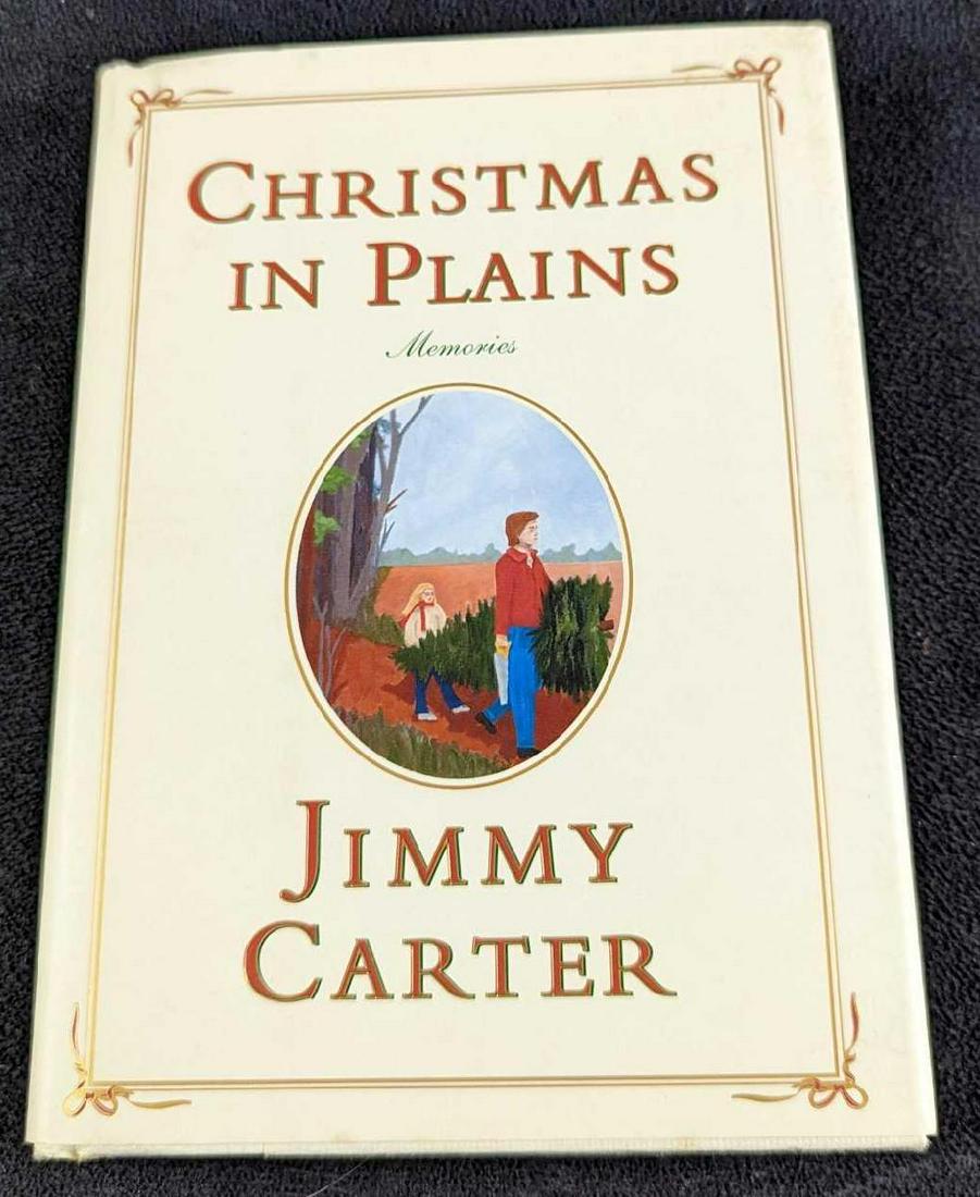 Jimmy Carter Christmas In Plains Hardcover: "Christmas In Plains" By Jimmy Carter. This was published by Simon & Schuster (New York) in 2001. The book is approx 5 1/4" x 3/8" x 7 1/4" and it weighs 0.55lb. The book is in a good, used condition