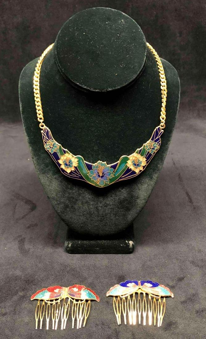 2 Butterfly Multi-Colored Decorative Enamel Hair Combs & Similar Style Necklace: This lot contains 2 butterfly multi-colored decorative enamel hair combs & similar style necklace. Each hair pin/comb is approx 1 3/4" x 2 3/4" while the necklace is approx 13 1/4" x 1 1/4". Altogethe